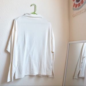 White turtle neck blouse